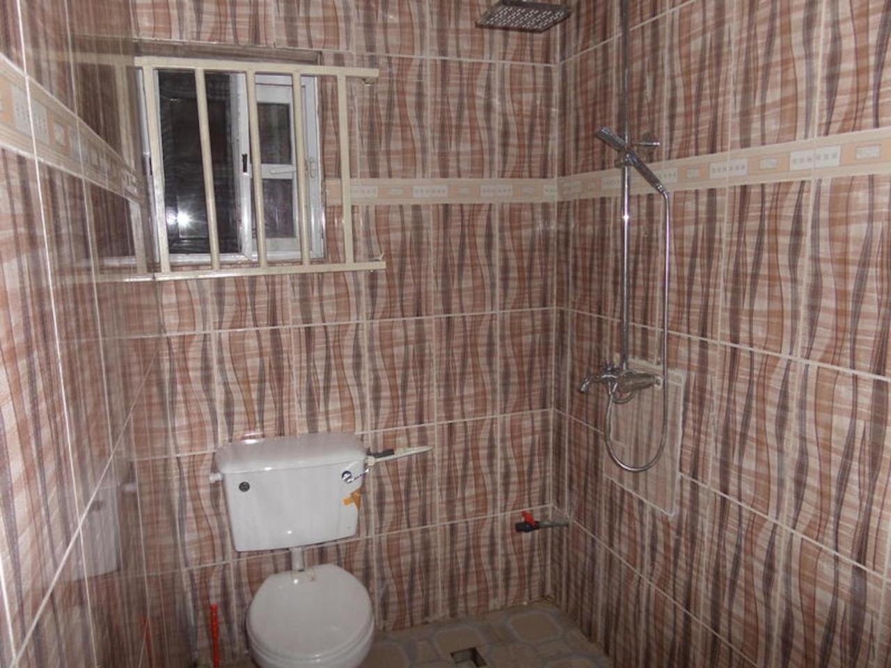 De-Zone Hotel Ikotun Екстер'єр фото